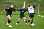 28 November 2023; Louise Quinn, left, and Chloe Mustaki during a Republic of Ireland women training session at the FAI National Training Centre in Abbotstown, Dublin. Photo by Stephen McCarthy/Sportsfile