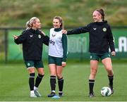 28 November 2023; Players, from left, Lily Agg, Ellen Dolan and Caitlin Hayes during a Republic of Ireland women training session at the FAI National Training Centre in Abbotstown, Dublin. Photo by Stephen McCarthy/Sportsfile