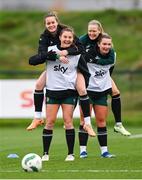 28 November 2023; Players, from left, Heather Payne, Kyra Carusa, Diane Caldwell and Saoirse Noonan during a Republic of Ireland women training session at the FAI National Training Centre in Abbotstown, Dublin. Photo by Stephen McCarthy/Sportsfile