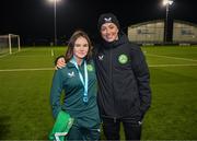 28 November 2023; Republic of Ireland's Katie McCabe with Eva Walsh of the Ireland women's cerebral palsy team, who were recently crowned champions of the International Federation of CP Football Nations League for 2023, at the FAI National Training Centre in Abbotstown, Dublin. Photo by Stephen McCarthy/Sportsfile