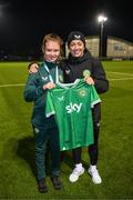 28 November 2023; Republic of Ireland's Katie McCabe with Robyn Ennis of the Ireland women's cerebral palsy team, who were recently crowned champions of the International Federation of CP Football Nations League for 2023, at the FAI National Training Centre in Abbotstown, Dublin. Photo by Stephen McCarthy/Sportsfile