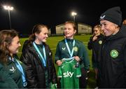 28 November 2023; Republic of Ireland's Katie McCabe with, from left, Eva Walsh, Reeva Merriman and Robyn Merriman; members of the Ireland women's cerebral palsy team, who were recently crowned champions of the International Federation of CP Football Nations League for 2023, at the FAI National Training Centre in Abbotstown, Dublin. Photo by Stephen McCarthy/Sportsfile