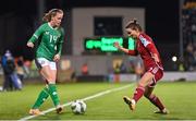 1 December 2023; Heather Payne of Republic of Ireland in action against Viktória Szabó of Hungary during the UEFA Women's Nations League B match between Republic of Ireland and Hungary at Tallaght Stadium in Dublin. Photo by Ben McShane/Sportsfile