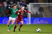 1 December 2023; Fanni Vachter of Hungary in action against Heather Payne of Republic of Ireland during the UEFA Women's Nations League B match between Republic of Ireland and Hungary at Tallaght Stadium in Dublin. Photo by Ben McShane/Sportsfile