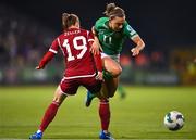 1 December 2023; Katie McCabe of Republic of Ireland in action against Dóra Zeller of Hungary during the UEFA Women's Nations League B match between Republic of Ireland and Hungary at Tallaght Stadium in Dublin. Photo by Seb Daly/Sportsfile