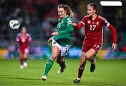 1 December 2023; Kyra Carusa of Republic of Ireland in action against Hanna Németh of Hungary during the UEFA Women's Nations League B match between Republic of Ireland and Hungary at Tallaght Stadium in Dublin. Photo by Ben McShane/Sportsfile