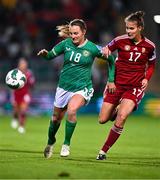 1 December 2023; Kyra Carusa of Republic of Ireland in action against Hanna Németh of Hungary during the UEFA Women's Nations League B match between Republic of Ireland and Hungary at Tallaght Stadium in Dublin. Photo by Ben McShane/Sportsfile