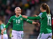 1 December 2023; Denise O'Sullivan of Republic of Ireland, left, and team-mate Kyra Carusa, celebrate after their side's first goal, an own goal scored by Henrietta Csiszár of Hungary, not pictured, during the UEFA Women's Nations League B match between Republic of Ireland and Hungary at Tallaght Stadium in Dublin. Photo by Seb Daly/Sportsfile