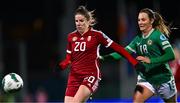 1 December 2023; Lilla Turányi of Hungary in action against Kyra Carusa of Republic of Ireland during the UEFA Women's Nations League B match between Republic of Ireland and Hungary at Tallaght Stadium in Dublin. Photo by Ben McShane/Sportsfile