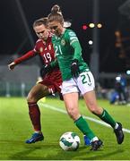 1 December 2023; Sinead Farrelly of Republic of Ireland in action against Dóra Zeller of Hungary during the UEFA Women's Nations League B match between Republic of Ireland and Hungary at Tallaght Stadium in Dublin. Photo by Ben McShane/Sportsfile