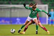 1 December 2023; Sinead Farrelly of Republic of Ireland in action against Viktória Szabó of Hungary during the UEFA Women's Nations League B match between Republic of Ireland and Hungary at Tallaght Stadium in Dublin. Photo by Seb Daly/Sportsfile