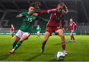 1 December 2023; Boglárka Vida of Hungary shields the ball from Lucy Quinn of Republic of Ireland during the UEFA Women's Nations League B match between Republic of Ireland and Hungary at Tallaght Stadium in Dublin. Photo by Ben McShane/Sportsfile