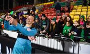 1 December 2023; Republic of Ireland goalkeeper Courtney Brosnan takes a photograph with supporters after their side's victory in the UEFA Women's Nations League B match between Republic of Ireland and Hungary at Tallaght Stadium in Dublin. Photo by Ben McShane/Sportsfile
