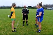 2 December 2023; Referee Gus Chapman with Ballinamore Sean O'Heslins captain Grainne Prior, left, and Steelstown Brian Ogs joint-captains Aoife Mc Gough, 3, and Ciara Mc Gurk before the Currentaccount.ie All-Ireland Ladies Intermediate Club Championship semi-final match between Ballinamore Sean O’Heslins of Leitrim and Steelstown Brian Ógs of Derry at Páirc Sheáin Ui Eislin, Ballinamore, Leitrim. Photo by Ben McShane/Sportsfile