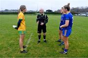 2 December 2023; Referee Gus Chapman with Ballinamore Sean O'Heslins captain Grainne Prior, left, and Steelstown Brian Ogs joint-captains Aoife Mc Gough, 3, and Ciara Mc Gurk before the Currentaccount.ie All-Ireland Ladies Intermediate Club Championship semi-final match between Ballinamore Sean O’Heslins of Leitrim and Steelstown Brian Ógs of Derry at Páirc Sheáin Ui Eislin, Ballinamore, Leitrim. Photo by Ben McShane/Sportsfile