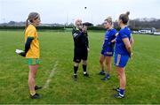 2 December 2023; Referee Gus Chapman performs the coin-toss in the company of Ballinamore Sean O'Heslins captain Grainne Prior, left, and Steelstown Brian Ogs joint-captains Aoife Mc Gough, 3, and Ciara Mc Gurk before the Currentaccount.ie All-Ireland Ladies Intermediate Club Championship semi-final match between Ballinamore Sean O’Heslins of Leitrim and Steelstown Brian Ógs of Derry at Páirc Sheáin Ui Eislin, Ballinamore, Leitrim. Photo by Ben McShane/Sportsfile