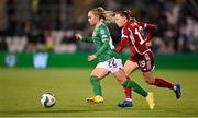 1 December 2023; Izzy Atkinson of Republic of Ireland in action against Dóra Zeller of Hungary during the UEFA Women's Nations League B match between Republic of Ireland and Hungary at Tallaght Stadium in Dublin. Photo by Seb Daly/Sportsfile