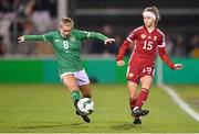 1 December 2023; Fanni Vachter of Hungary in action against Ruesha Littlejohn of Republic of Ireland during the UEFA Women's Nations League B match between Republic of Ireland and Hungary at Tallaght Stadium in Dublin. Photo by Seb Daly/Sportsfile