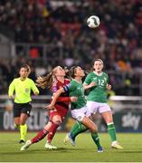 1 December 2023; Katie McCabe of Republic of Ireland in action against Henrietta Csiszár of Hungary during the UEFA Women's Nations League B match between Republic of Ireland and Hungary at Tallaght Stadium in Dublin. Photo by Seb Daly/Sportsfile