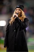 1 December 2023; Singer Lisa Lambe performs Amhrán na bhFiann before the UEFA Women's Nations League B match between Republic of Ireland and Hungary at Tallaght Stadium in Dublin. Photo by Seb Daly/Sportsfile