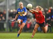 2 December 2023; Aoife Ryan of Gusserane in action against Laura O'Mahony of O'Donovan Rossa during the Currentaccount.ie All-Ireland Ladies Junior Club Championship semi-final match between O’Donovan Rossa of Cork and Gusserane of Wexford at O’Donovan Rossa GAA, Cork. Photo by Eóin Noonan/Sportsfile