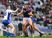 2 December 2023; Shane Walsh of Kilmacud Crokes in action against Paul McDermott, left, and Mark Maguire of Naas during the AIB Leinster GAA Football Senior Club Championship final match between Kilmacud Crokes, Dublin, and Naas, Kildare, at Croke Park in Dublin. Photo by Daire Brennan/Sportsfile
