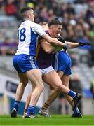 2 December 2023; Shane Walsh of Kilmacud Crokes in action against Conor McCarthy, left, and Mark Maguire of Naas during the AIB Leinster GAA Football Senior Club Championship final match between Kilmacud Crokes, Dublin, and Naas, Kildare, at Croke Park in Dublin. Photo by Daire Brennan/Sportsfile