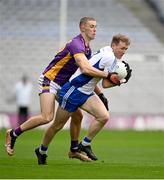 2 December 2023; Brian Byrne of Naas in action against Paul Mannion of Kilmacud Crokes during the AIB Leinster GAA Football Senior Club Championship final match between Kilmacud Crokes, Dublin, and Naas, Kildare, at Croke Park in Dublin. Photo by Stephen Marken/Sportsfile