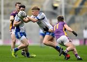 2 December 2023; Mark Maguire of Naas in action against Shane Cunningham of Kilmacud Crokes during the AIB Leinster GAA Football Senior Club Championship final match between Kilmacud Crokes, Dublin, and Naas, Kildare, at Croke Park in Dublin. Photo by Daire Brennan/Sportsfile