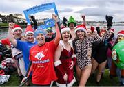 2 December 2023; Members of the Dublin Seals swim club take part in the Sandycove Polar Plunge which saw participants get “Freezin’ for a Reason” to raise funds for Special Olympics Ireland athletes in an event sponsored by Gala Retail at Sandycove Beach in Dublin. Photo by David Fitzgerald/Sportsfile