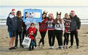 2 December 2023; Participants from Athboy at the Clogherhead Polar Plunge which saw participants get “Freezin’ for a Reason” to raise funds for Special Olympics Ireland athletes in an event sponsored by Gala Retail at Clogherhead Beach in Louth. Photo by Oliver McVeigh/Sportsfile