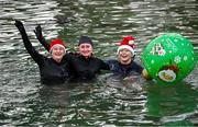 2 December 2023; From left, Jackie Field, Aisling Field and Imelda Malone from Dublin take part in the Sandycove Polar Plunge which saw participants get “Freezin’ for a Reason” to raise funds for Special Olympics Ireland athletes in an event sponsored by Gala Retail at Sandycove Beach in Dublin. Photo by David Fitzgerald/Sportsfile