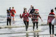 2 December 2023; Participants during The Clogherhead Polar Plunge which saw participants get “Freezin’ for a Reason” to raise funds for Special Olympics Ireland athletes in an event sponsored by Gala Retail at Clogherhead Beach in Louth. Photo by Oliver McVeigh/Sportsfile