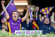 2 December 2023; Kilmacud Crokes captain Shane Cunningham lifts the Sean McCabe cup with kitman Vinny Patterson after their side's victory in the AIB Leinster GAA Football Senior Club Championship final match between Kilmacud Crokes, Dublin, and Naas, Kildare, at Croke Park in Dublin. Photo by Stephen Marken/Sportsfile