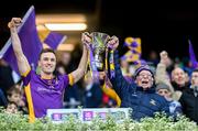 2 December 2023; Kilmacud Crokes captain Shane Cunningham lifts the Sean McCabe cup with kitman Vinny Patterson after their side's victory in the AIB Leinster GAA Football Senior Club Championship final match between Kilmacud Crokes, Dublin, and Naas, Kildare, at Croke Park in Dublin. Photo by Stephen Marken/Sportsfile