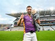 2 December 2023; Shane Horan of Kilmacud Crokes, with his son Rian, age 4 months, after the AIB Leinster GAA Football Senior Club Championship final match between Kilmacud Crokes, Dublin, and Naas, Kildare, at Croke Park in Dublin. Photo by Stephen Marken/Sportsfile