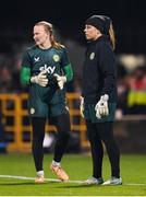 1 December 2023; Republic of Ireland goalkeepers Grace Moloney, right, and Courtney Brosnan before the UEFA Women's Nations League B match between Republic of Ireland and Hungary at Tallaght Stadium in Dublin. Photo by Seb Daly/Sportsfile