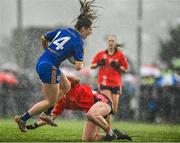 2 December 2023; Aisling Murphy of Gusserane is tackled by Sarah Hurley of O'Donovan Rossa during the Currentaccount.ie All-Ireland Ladies Junior Club Championship semi-final match between O’Donovan Rossa of Cork and Gusserane of Wexford at O’Donovan Rossa GAA, Cork. Photo by Eóin Noonan/Sportsfile