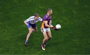 2 December 2023; Paul Mannion of Kilmacud Crokes in action against Mark Maguire of Naas during the AIB Leinster GAA Football Senior Club Championship final match between Kilmacud Crokes, Dublin, and Naas, Kildare, at Croke Park in Dublin. Photo by Daire Brennan/Sportsfile