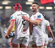 2 December 2023; Tom Stewart of Ulster celebrates with John Cooney, right, after scoring their side's first try during the United Rugby Championship match between Ulster and Edinburgh at Kingspan Stadium in Belfast. Photo by Ramsey Cardy/Sportsfile