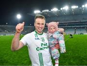 2 December 2023; Mark Bergin of O'Loughlin Gaels with his daughter Maeve, 10 months,  after his side's victory during the AIB Leinster GAA Hurling Senior Club Championship final match between O'Loughlin Gaels, Kilkenny, and Na Fianna, Dublin, at Croke Park in Dublin. Photo by Stephen Marken/Sportsfile