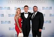 2 December 2023; Sam Curtis of St Patrick's Athletic with parents Darren and Lisa Curtis on arrival at the PFA Ireland Awards 2023 at Anantara The Marker Dublin Hotel in Dublin. Photo by Stephen McCarthy/Sportsfile