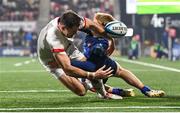 2 December 2023; Jacob Stockdale of Ulster is tackled by Harry Paterson of Edinburgh during the United Rugby Championship match between Ulster and Edinburgh at Kingspan Stadium in Belfast. Photo by Ramsey Cardy/Sportsfile