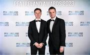 2 December 2023; Recently retired Shelbourne captain Luke Byrne, left, and PFA Ireland chairperson Brendan Clarke on arrival at the PFA Ireland Awards 2023 at Anantara The Marker Dublin Hotel in Dublin. Photo by Stephen McCarthy/Sportsfile