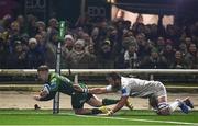 2 December 2023; David Hawkshaw of Connacht dives over to scoring his side's first try despite the tackle of Jason Jenkins of Leinster during the United Rugby Championship match between Connacht and Leinster at the Sportsground in Galway. Photo by Harry Murphy/Sportsfile