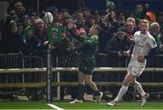 2 December 2023; David Hawkshaw of Connacht celebrates after scoring his side's first try as Ciarán Frawley of Leinster looks on during the United Rugby Championship match between Connacht and Leinster at the Sportsground in Galway. Photo by Harry Murphy/Sportsfile