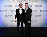 2 December 2023; Roberto Lopes of Shamrock Rovers, left, and PFA Ireland chairperson Brendan Clarke during the PFA Ireland Awards 2023 at Anantara The Marker Dublin Hotel in Dublin. Photo by Stephen McCarthy/Sportsfile