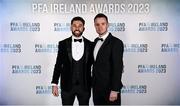2 December 2023; Roberto Lopes of Shamrock Rovers, left, and PFA Ireland chairperson Brendan Clarke during the PFA Ireland Awards 2023 at Anantara The Marker Dublin Hotel in Dublin. Photo by Stephen McCarthy/Sportsfile