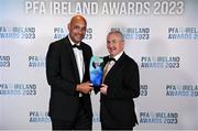 2 December 2023; Republic of Ireland U16 manager Paul Osam, left, presents Galway United manager John Caulfield with the PFA Ireland Men's First Division Manager of the Year award during the PFA Ireland Awards 2023 at Anantara The Marker Dublin Hotel in Dublin. Photo by Stephen McCarthy/Sportsfile