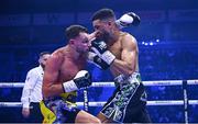 2 December 2023; Sean McComb, left, and Sam Maxwell during their WBO European super lightweight bout at the SSE Arena in Belfast. Photo by Ramsey Cardy/Sportsfile